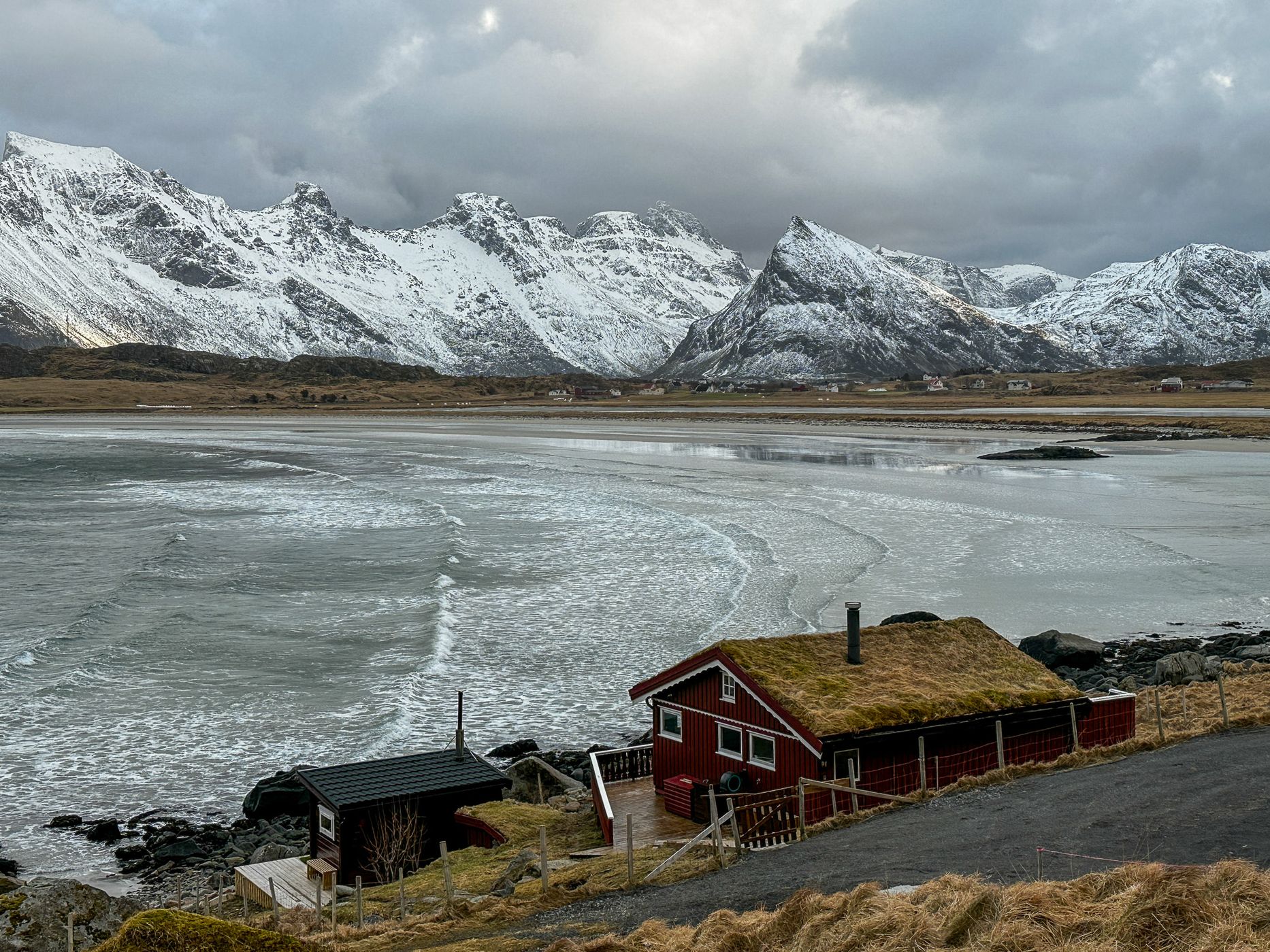 Beach houses with a view of Sandøya, Lofoten, Norway
