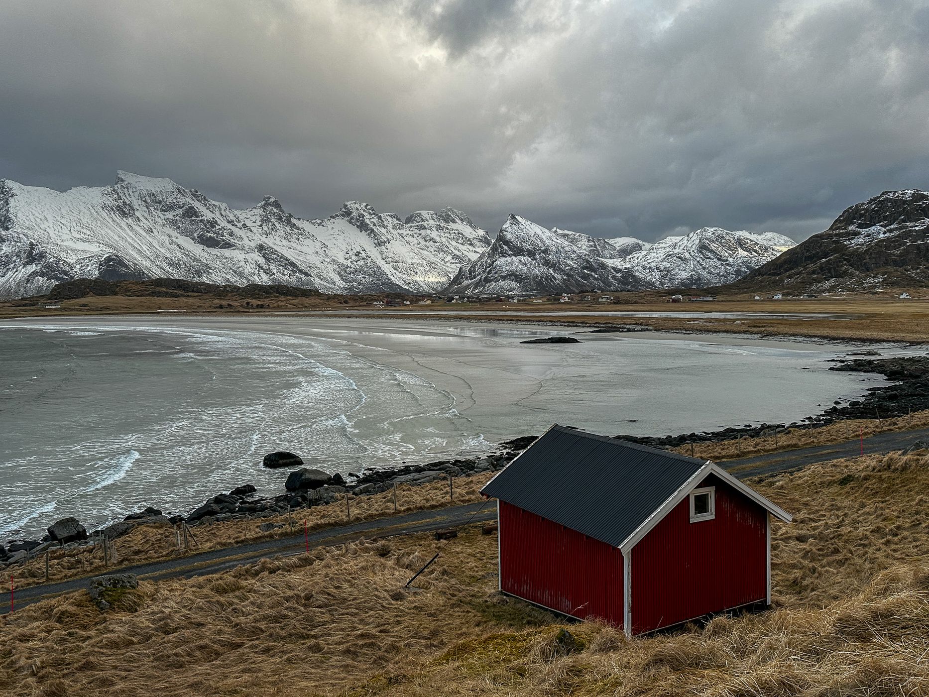 Beach houses with a view of Sandøya, Lofoten, Norway