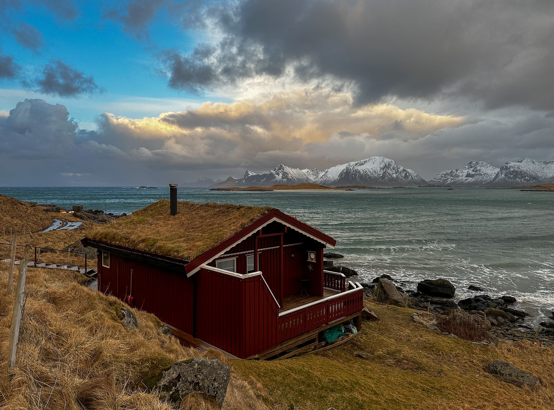 Beach houses with a view of Sandøya, Lofoten, Norway
