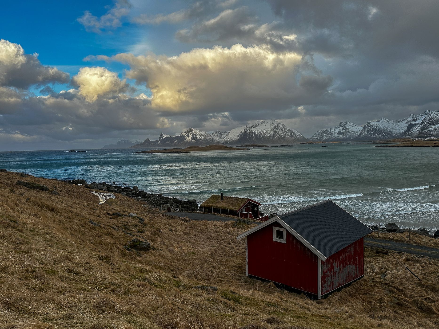 Beach houses with a view of Sandøya, Lofoten, Norway