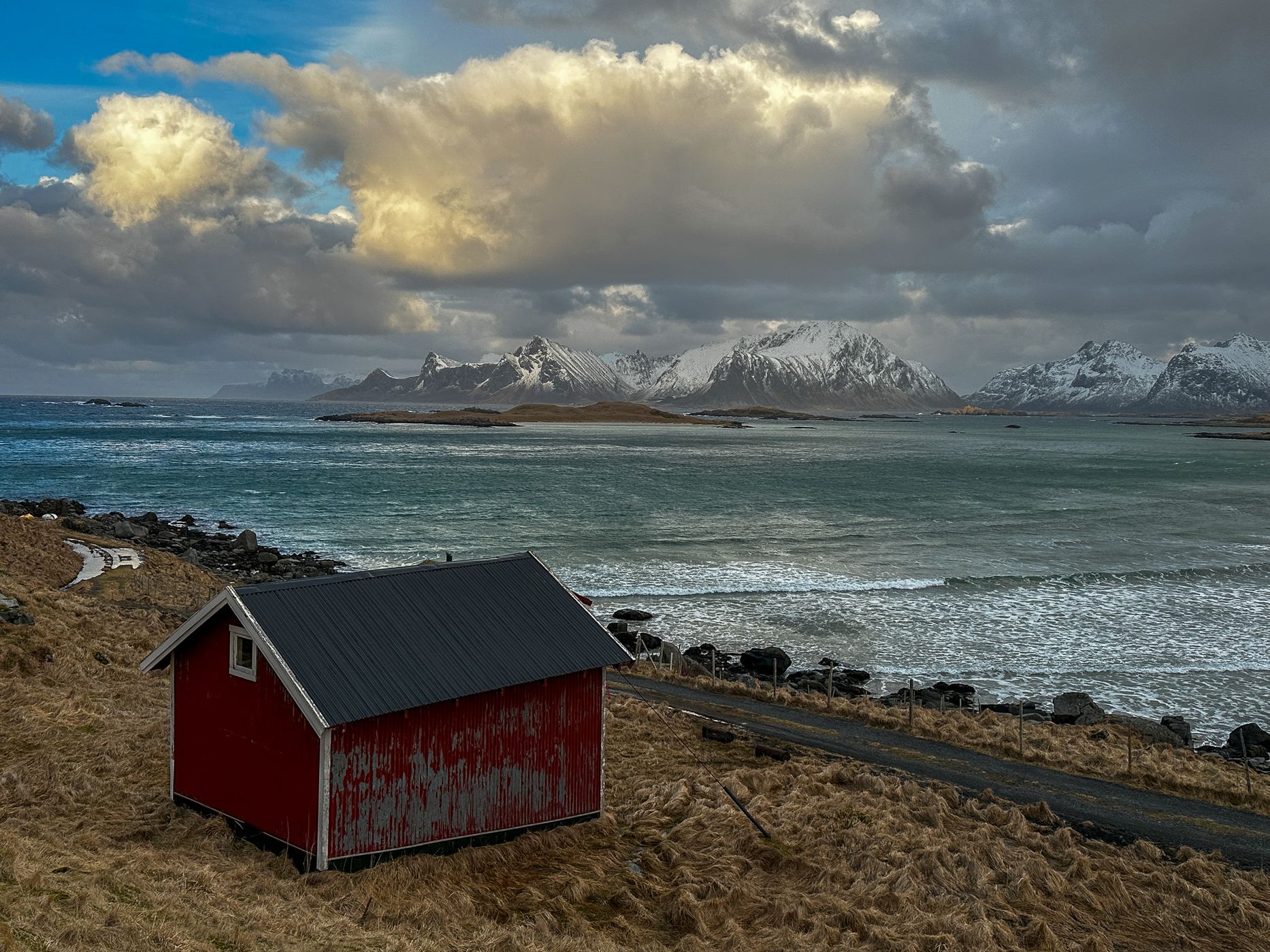Beach houses with a view of Sandøya, Lofoten, Norway