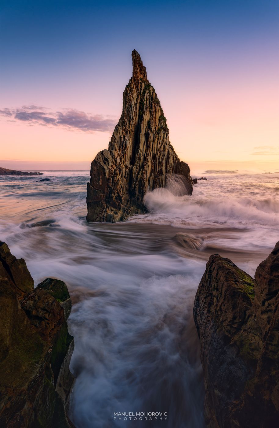 Triangular Rock at Playa de Mexota, Spain