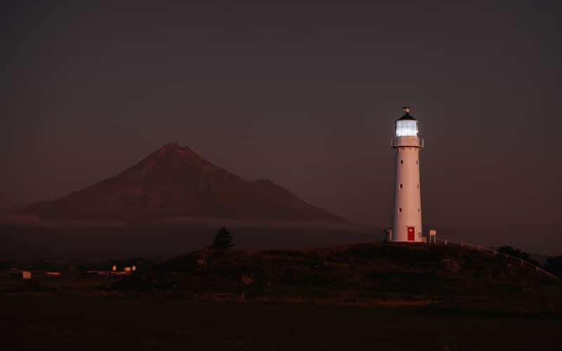 Cape Egmont Lighthouse with Mount Taranaki, Pungarehu