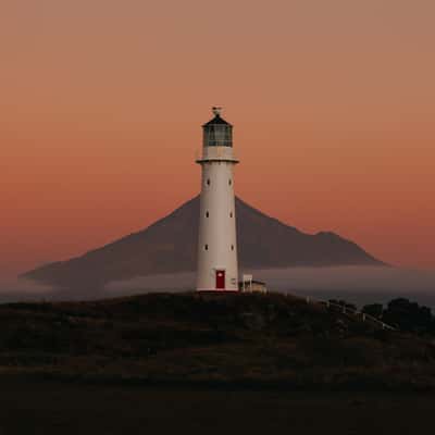 Cape Egmont Lighthouse with Mount Taranaki, Pungarehu, New Zealand