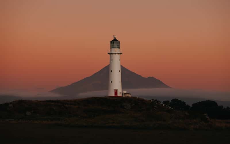 Cape Egmont Lighthouse with Mount Taranaki, Pungarehu