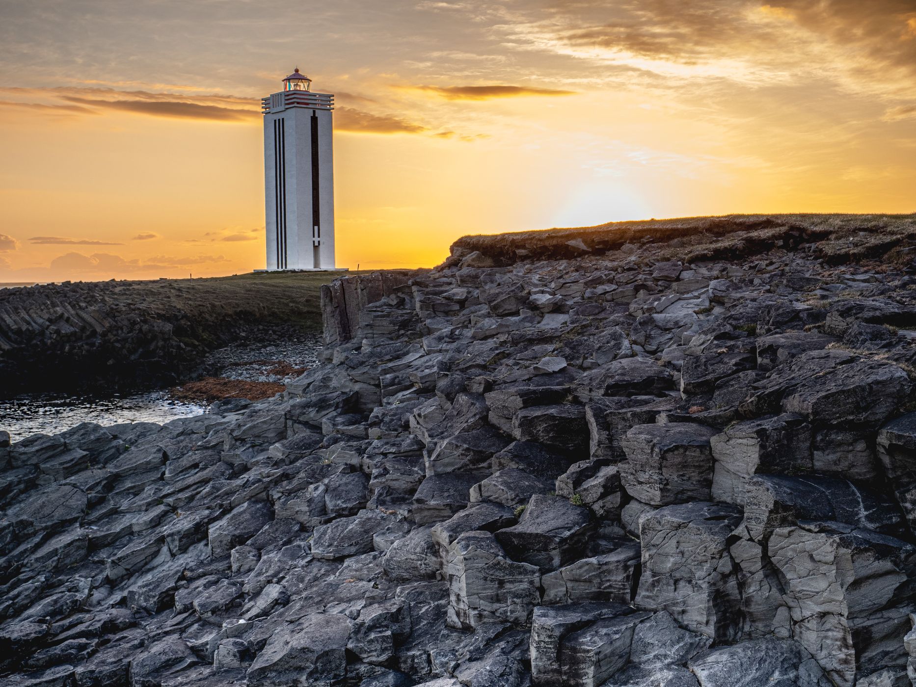 Kalfshamarsvik Lighthouse from the Stone Beach, Iceland