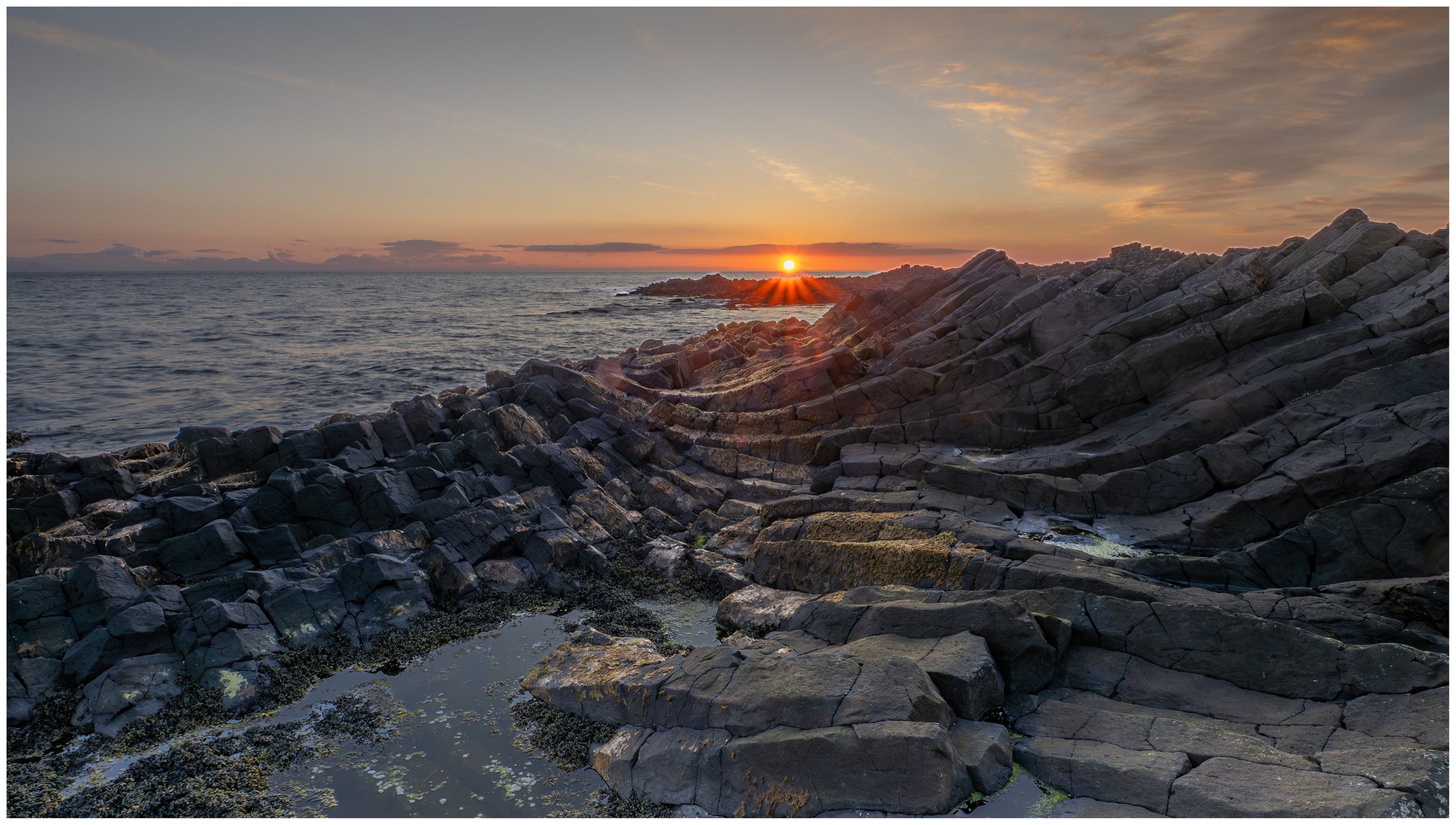 Kalfshamarsvik Lighthouse from the Stone Beach, Iceland
