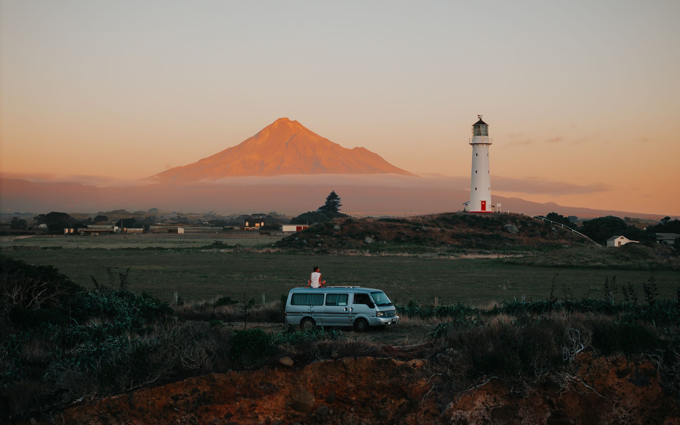 Cape Egmont Lighthouse with Mount Taranaki, Pungarehu, New Zealand