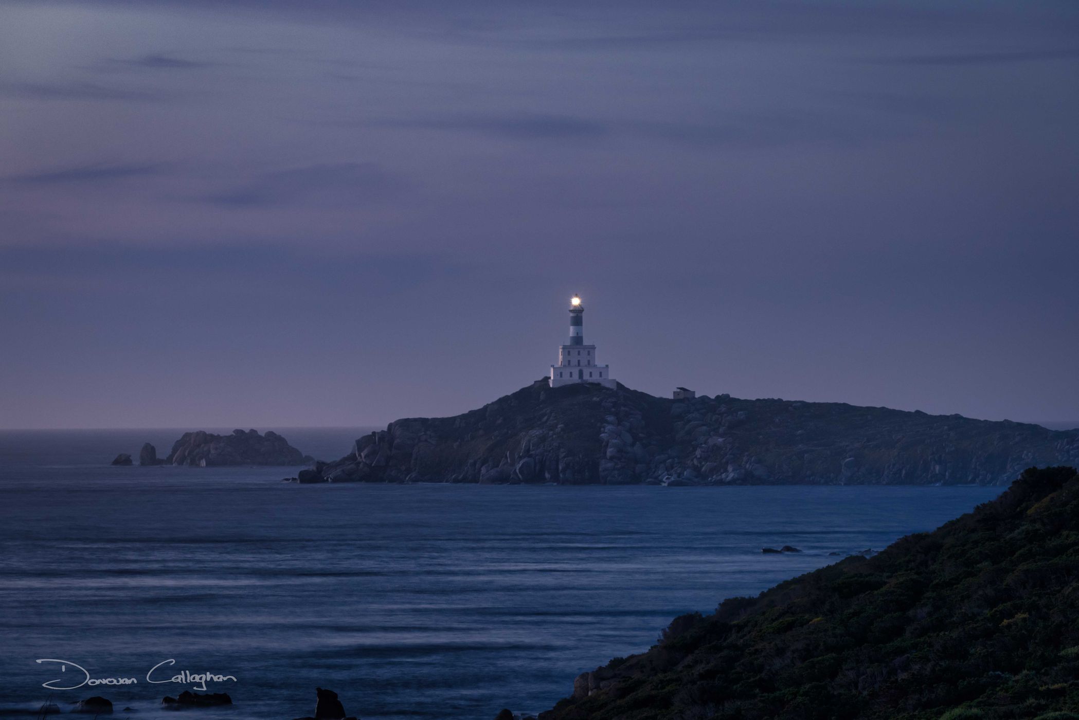 Faro Dell'Isola Dei Cavoli Lighthouse, Sardinia, Italy
