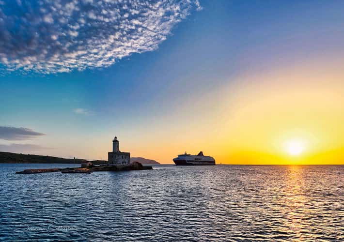 Lighthouse & ship, Faro di Bocca Lighthouse, Olbia, Sardinia