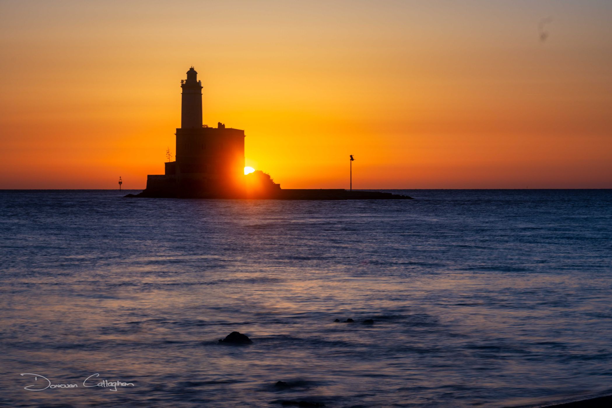 Lighthouse & ship, Faro di Bocca Lighthouse, Olbia, Sardinia, Italy
