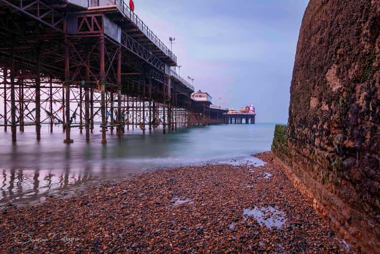 Beside the pier. Brighton, England