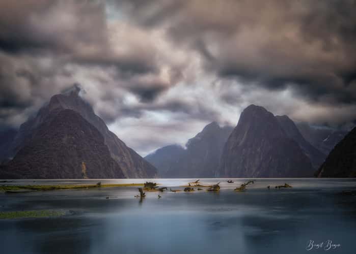 Milford Sound sunset with foreground  rock South Island