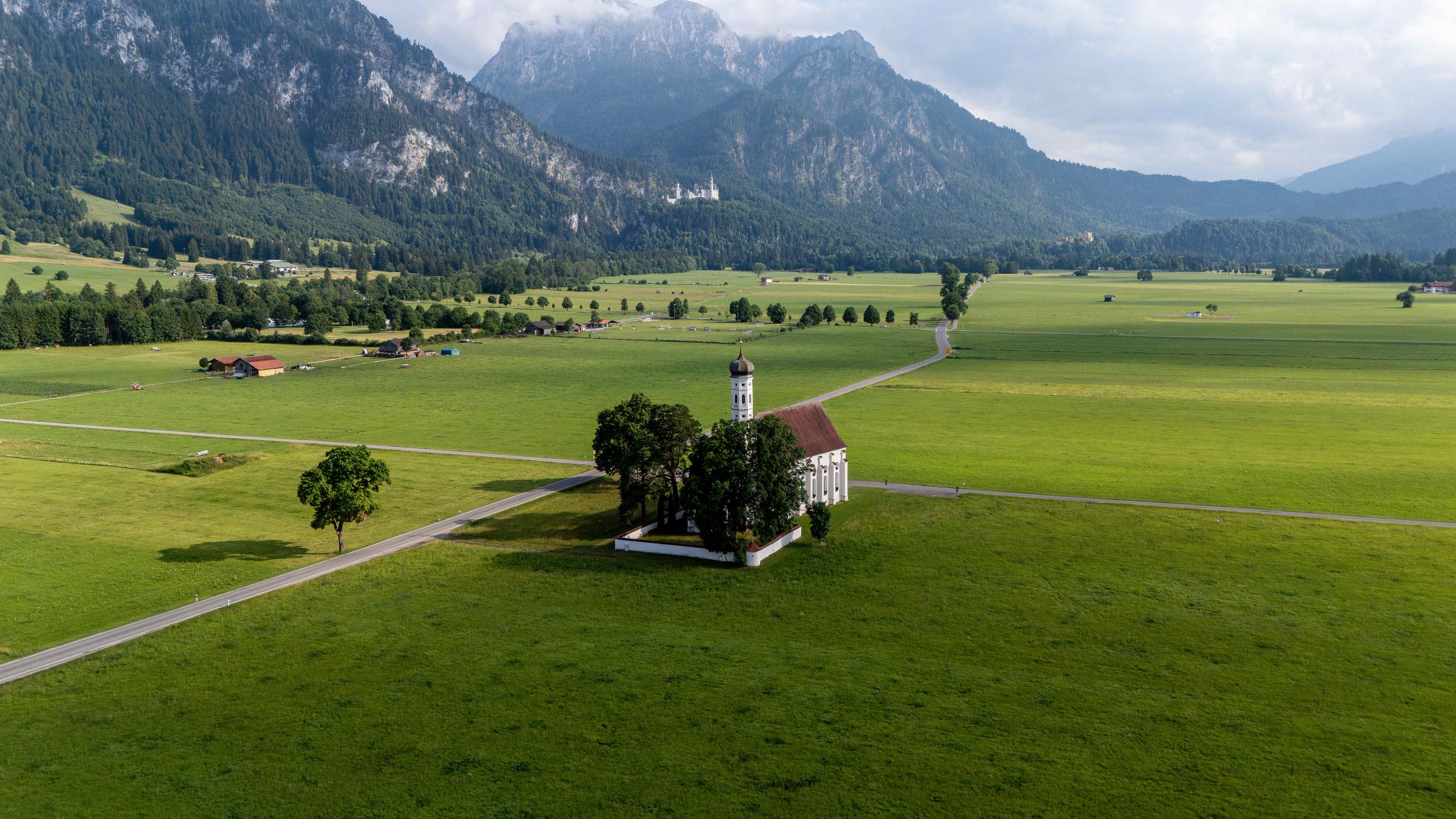St. Coloman Church with Neuschwanstein, Bavaria, Germany