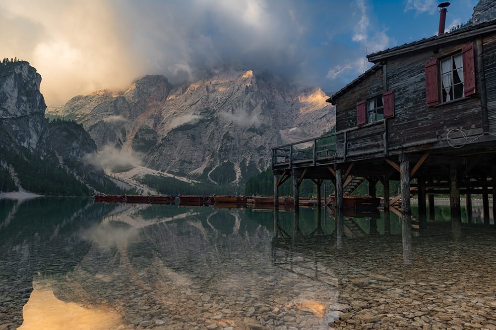 Wooden house on Lago Braies in Dolomites, Italy