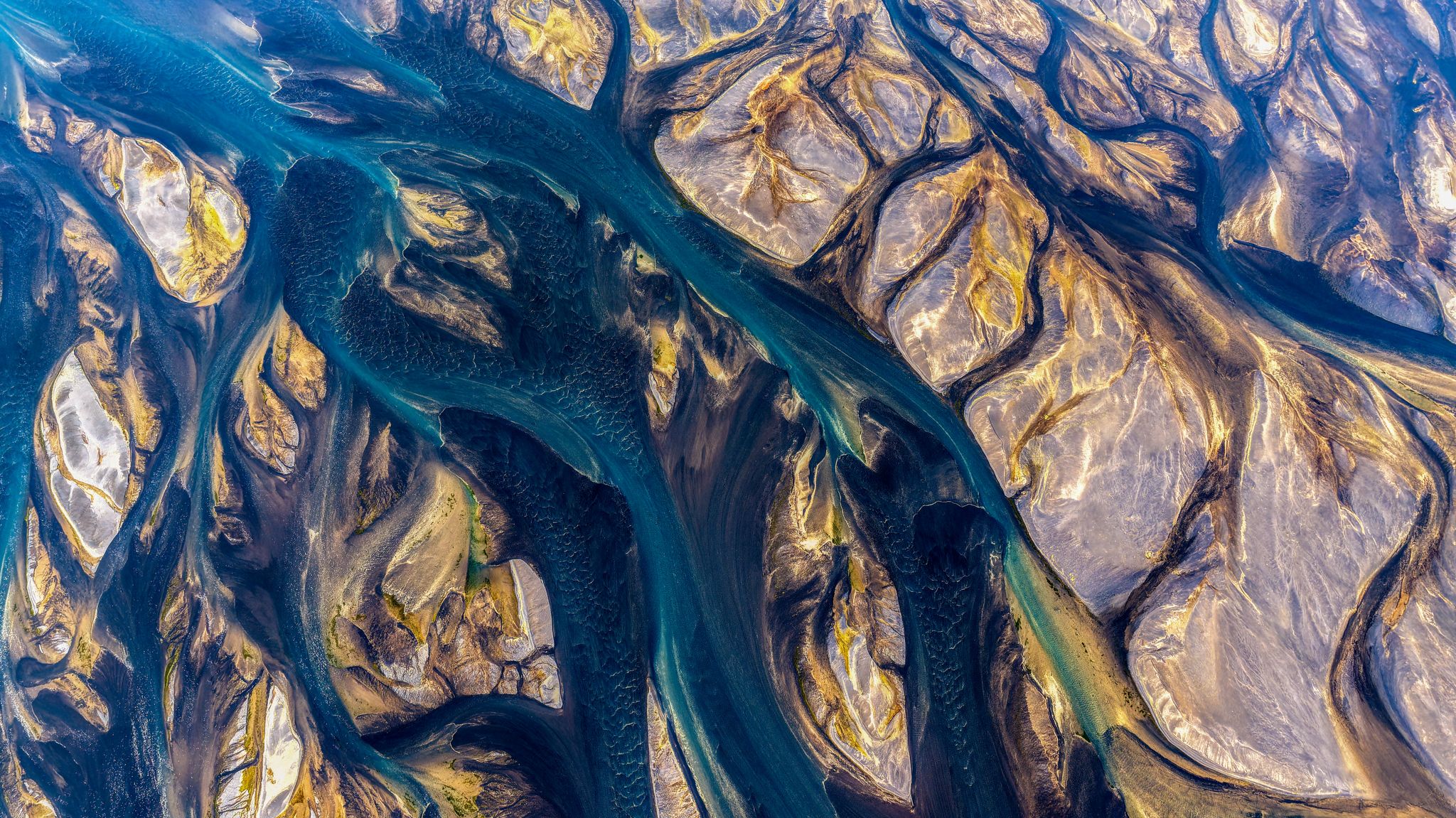 The unique pattern of a glacial river., Iceland