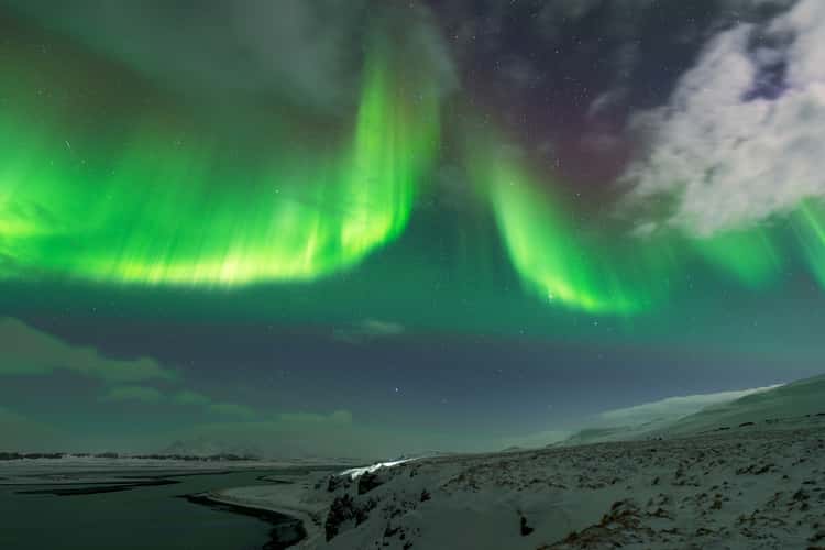 Aurora borealis above Hvitserkur, North Iceland