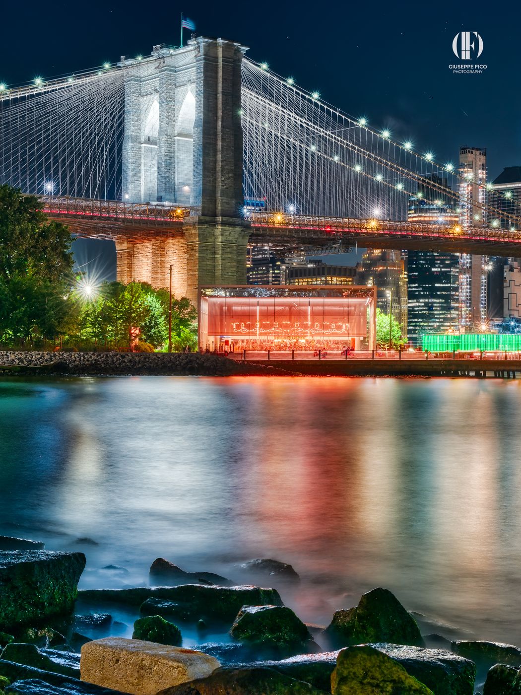 Brooklyn Bridge skyline from Pebble Beach, New York City, USA