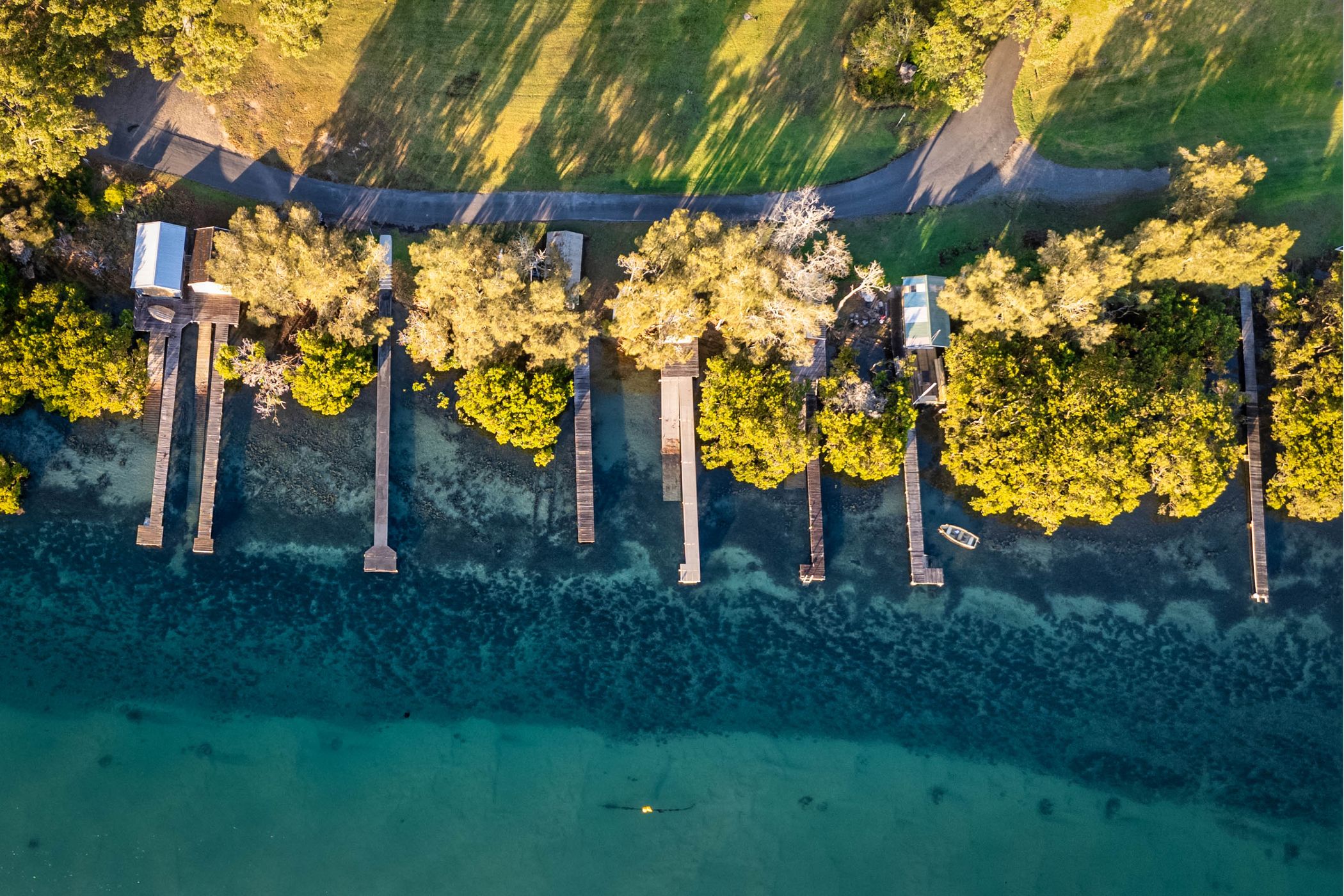 Jetties and sunrise, Mossy Point, South Coast, NSW, Australia