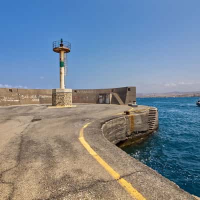 Lighthouse on the pier in Heraklion, Greece