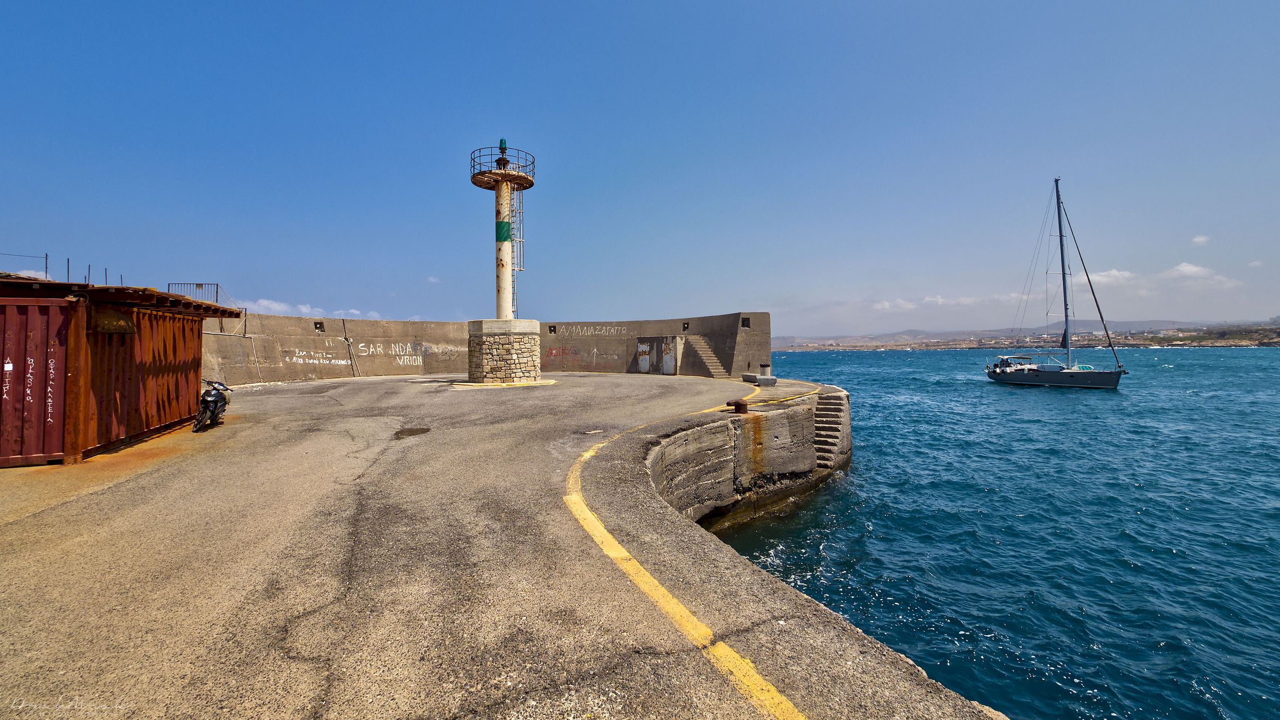 Lighthouse on the pier in Heraklion, Greece