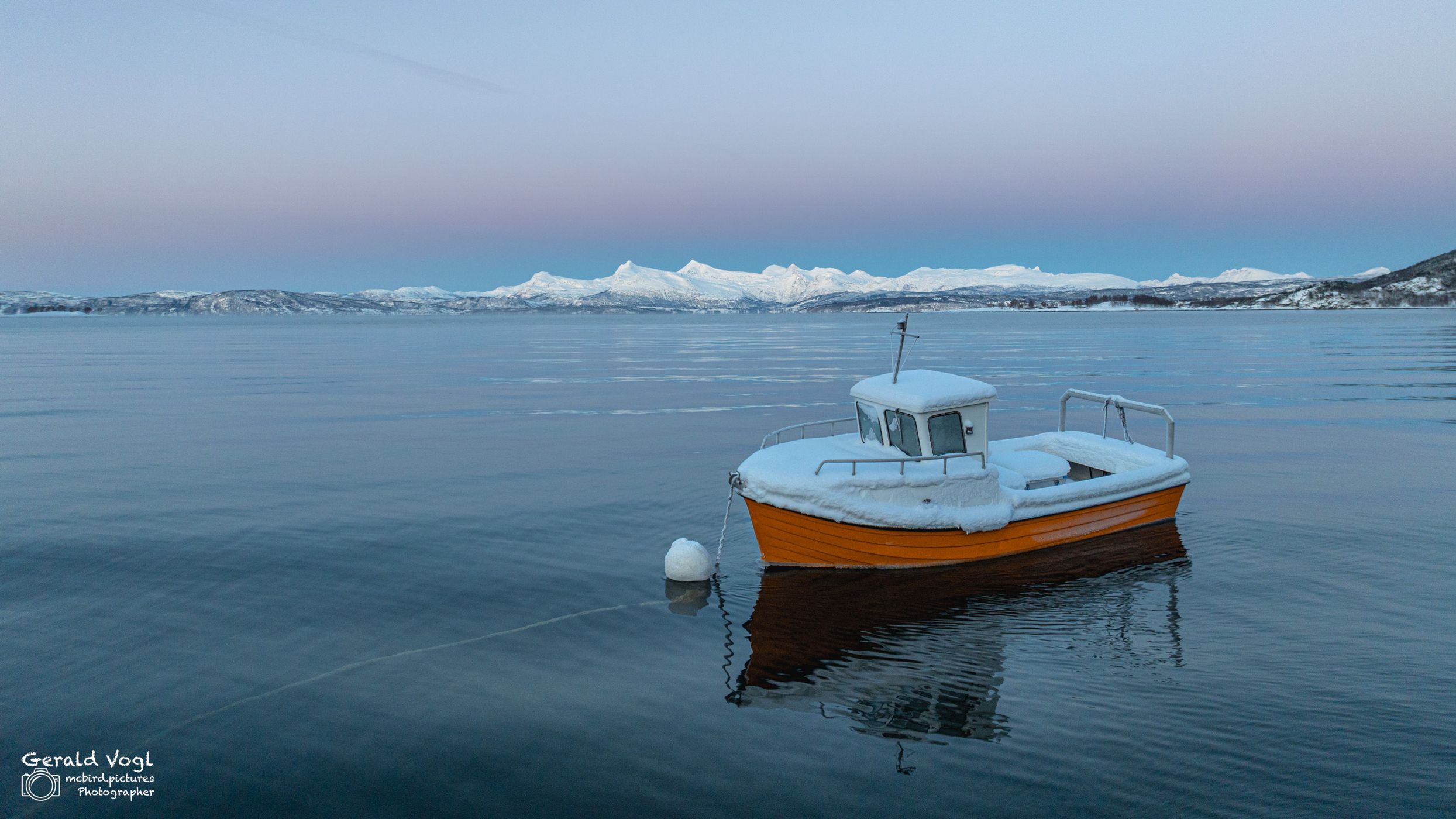 Boat in the fjord near Rana, Norway