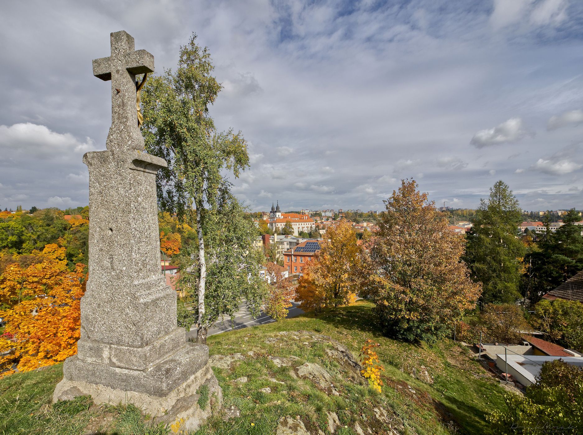 The cross on 'Kanciborek' and the view of the castle, Czech Republic