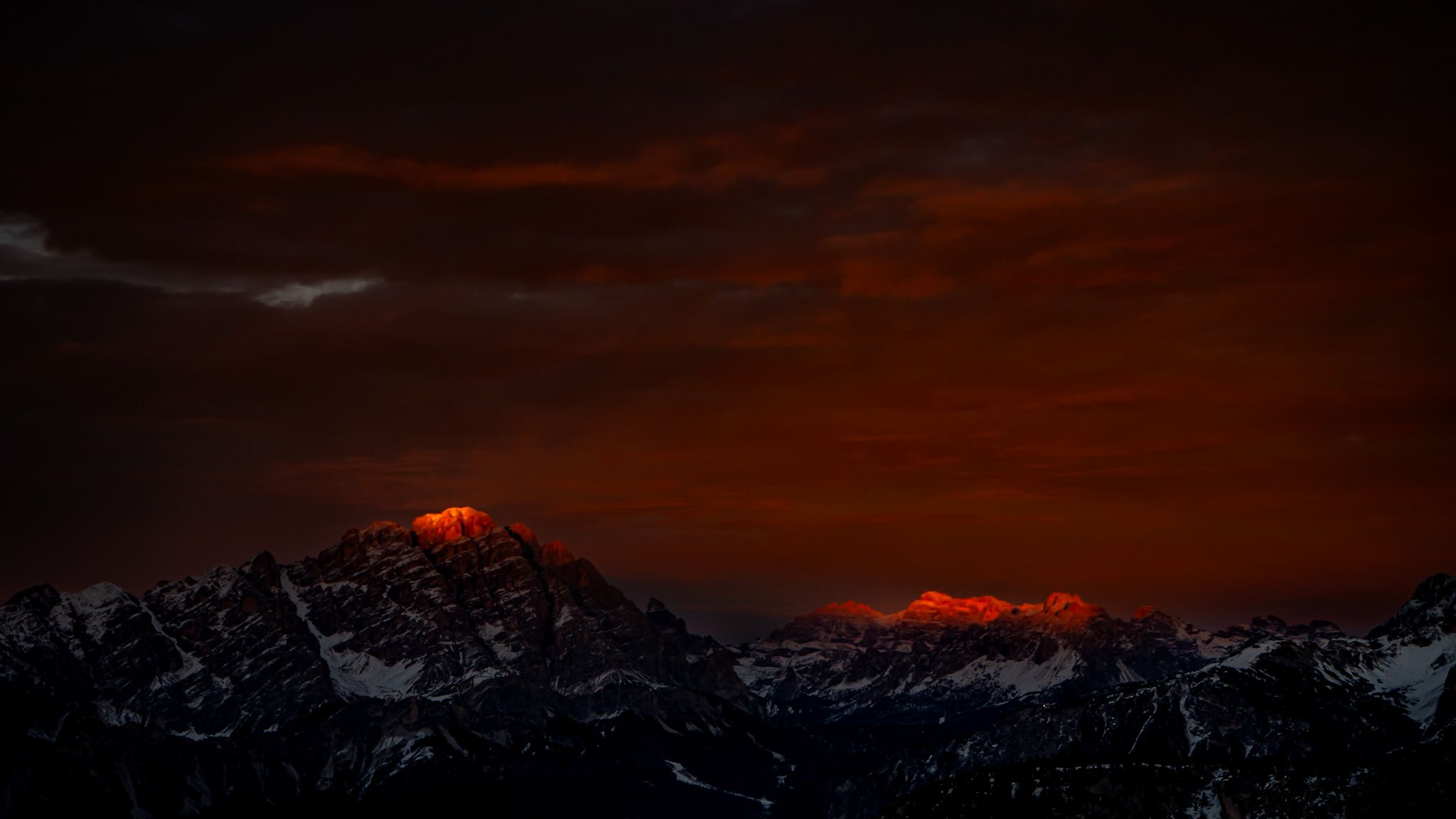 Alpenglow over the Dolomites near Passo Giau, Italy