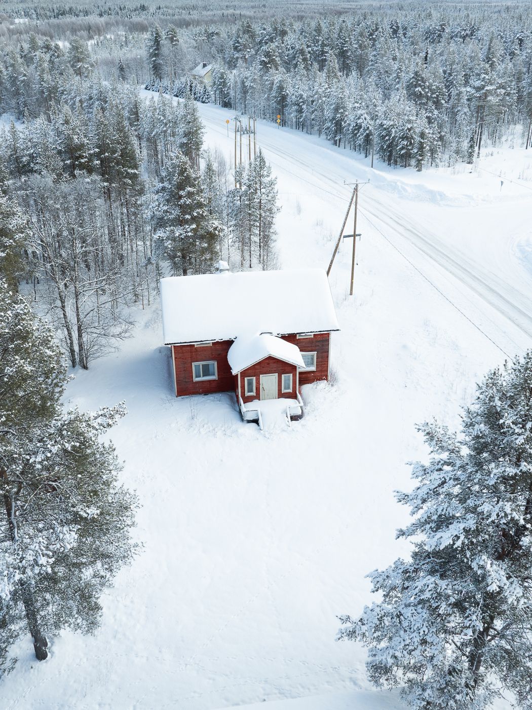 Red cabin on the side of the road, Finland