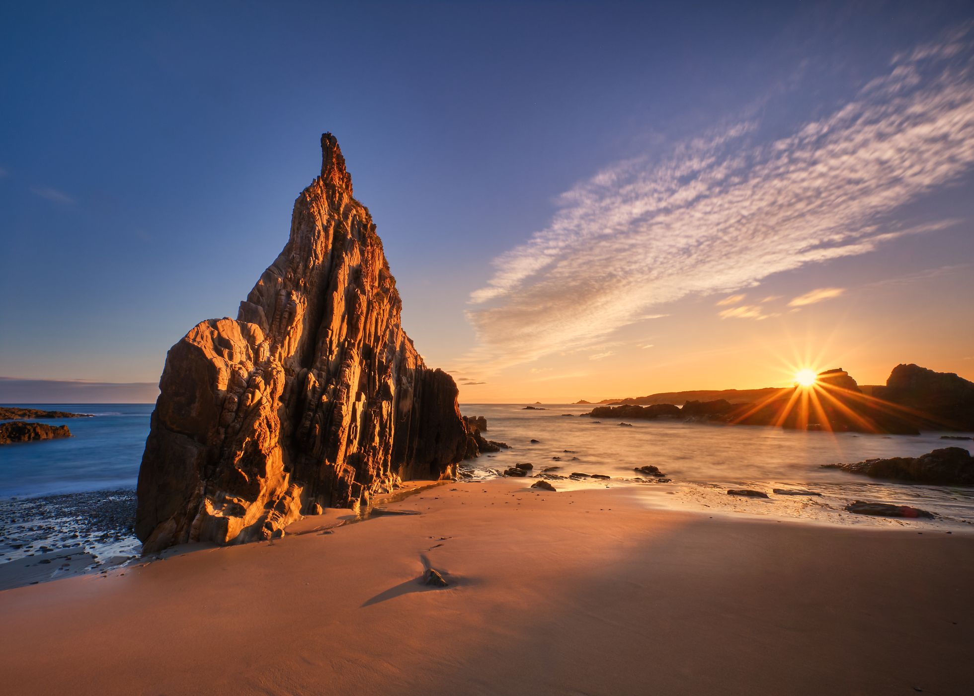 Triangular Rock at Playa de Mexota, Spain