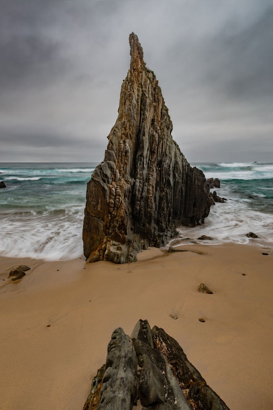 Triangular Rock at Playa de Mexota, Spain