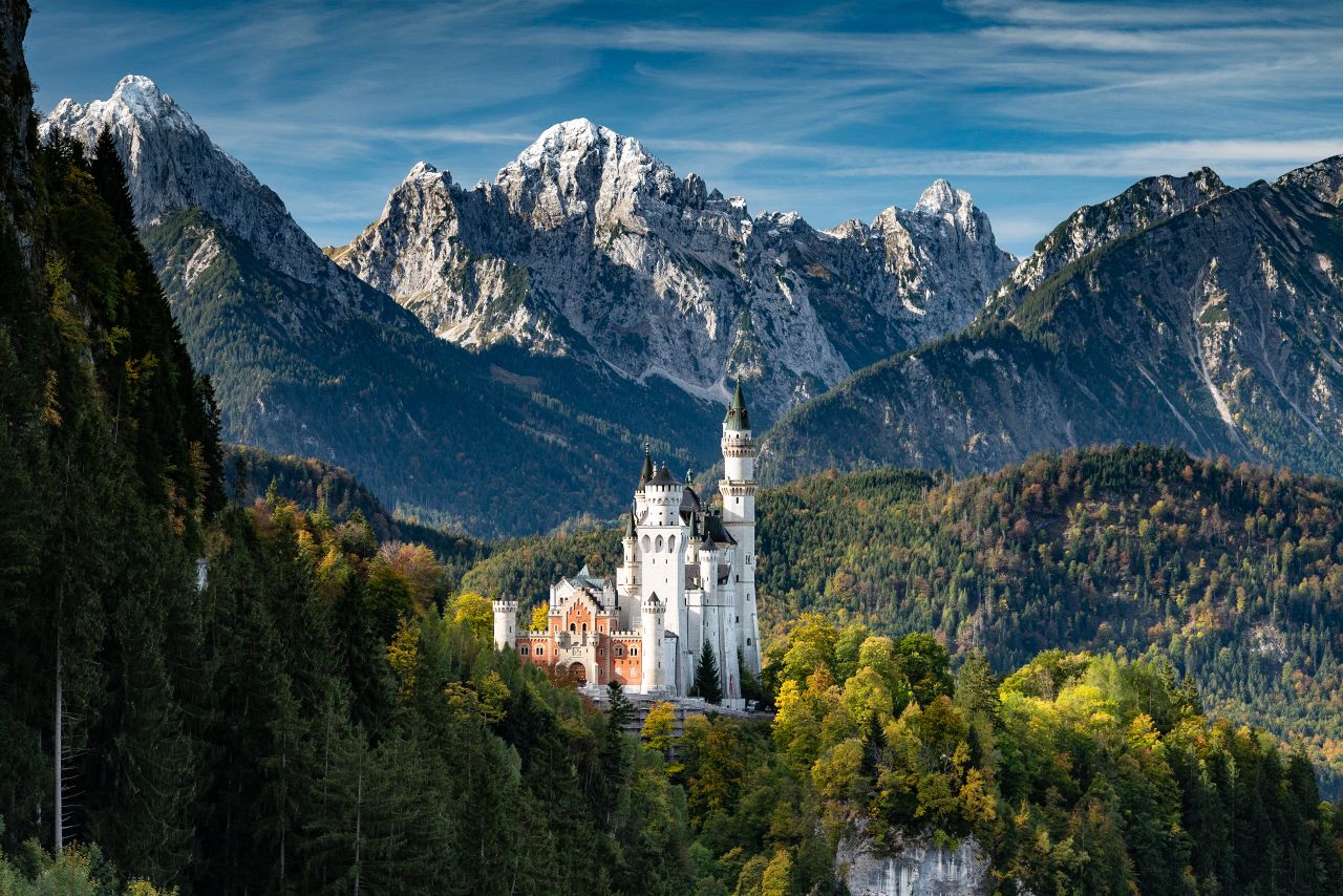 Neuschwanstein Castle with Mountain Range Backdrop, Germany