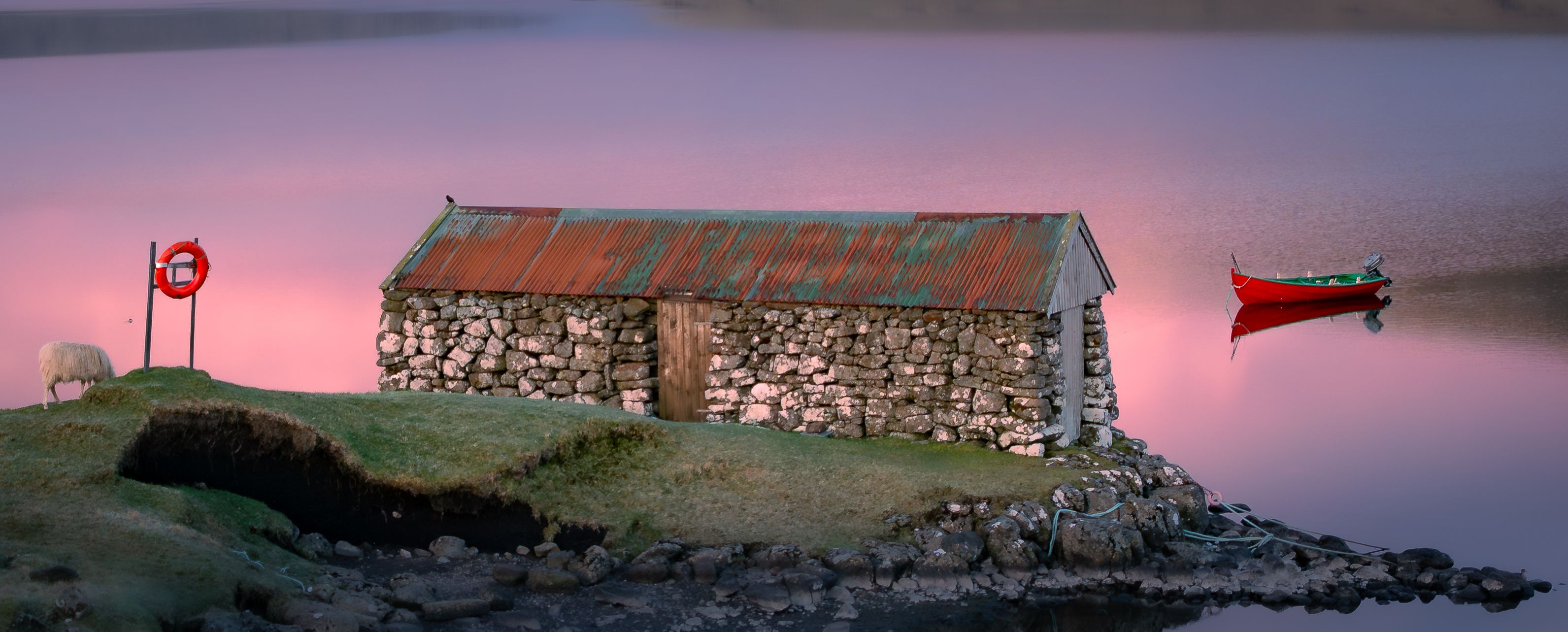 Fishing huts by Lake Sørvágsvatn, Faroe Islands