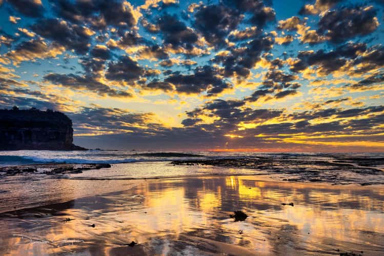 The basin Sunrise with swimmer, Mona Vale, Sydney