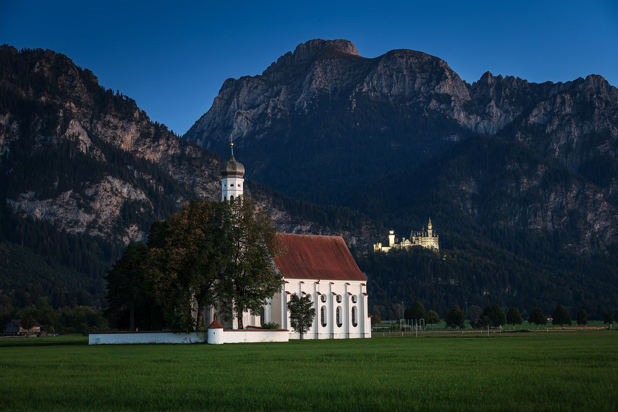 St. Coloman Church with Neuschwanstein, Bavaria, Germany