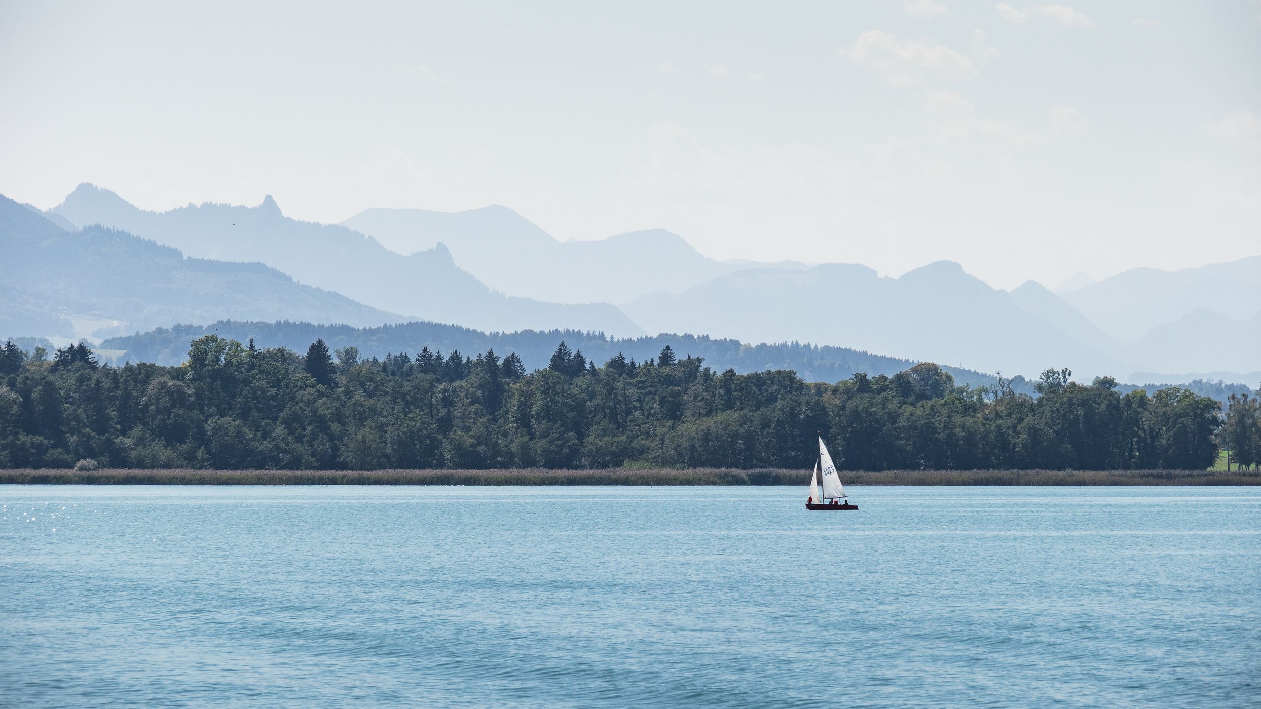 View to the Alps across Lake Chiemsee, Germany
