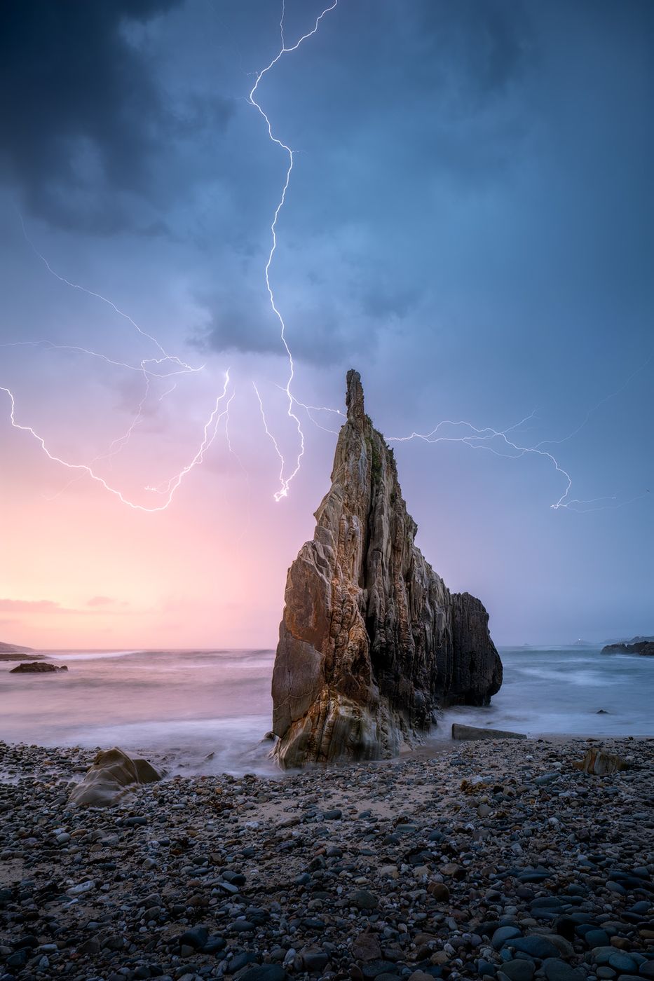 Triangular Rock at Playa de Mexota, Spain